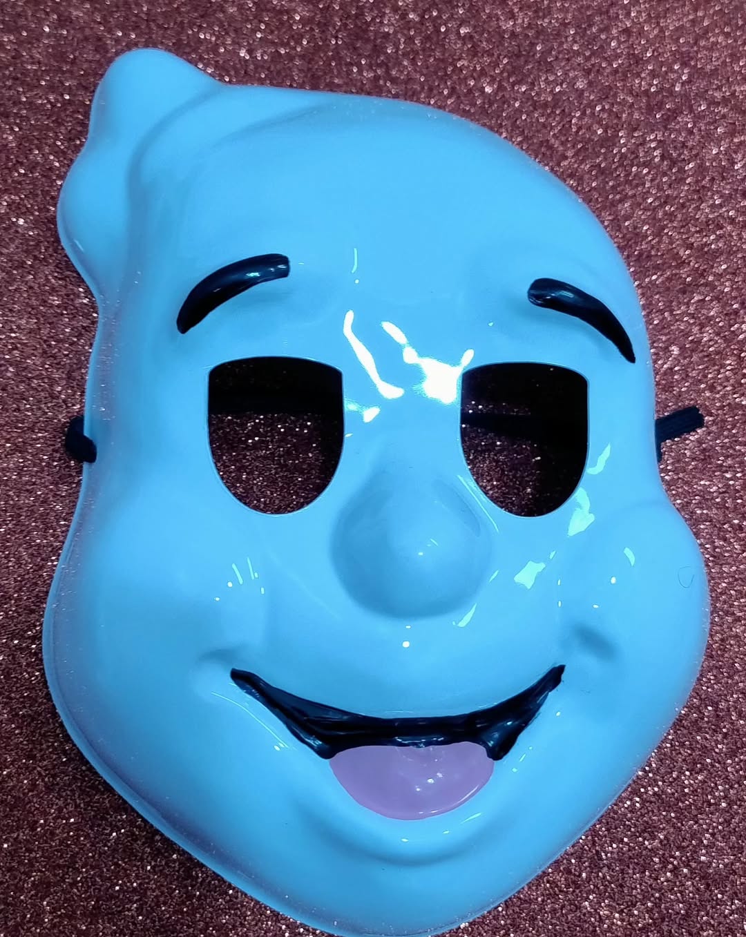 Máscara de personaje azul sonriente
